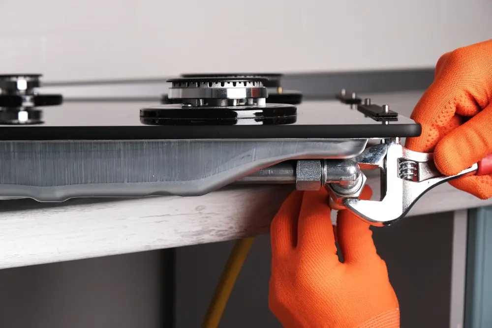 connecting gas hose to hob