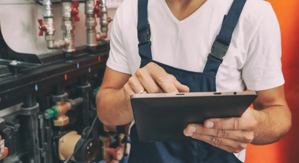 plumber checking the heating system